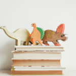 Discover the best dinosaur books for beginning readers that combine high-interest topics with controlled text, phonics practice, and nonfiction reading skills. Expert recommendations for parents.